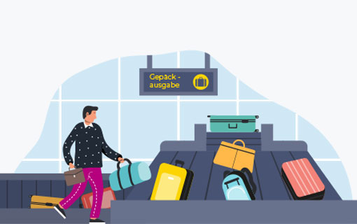 Mann mit Koffer am Flughafen am Gepäckband